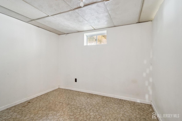 9 Merion Dr, Manalapan, NJ 07726 - below grade area featuring tile patterned floors and baseboards