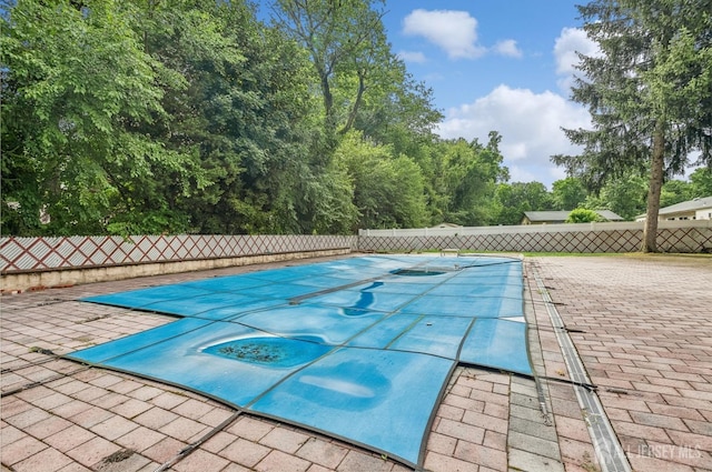 9 Merion Dr, Manalapan, NJ 07726 - view of swimming pool featuring a fenced backyard and a patio area