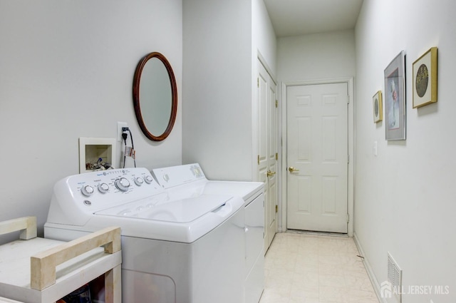 543 Waterside Blvd, Monroe, NJ 08831 - laundry room with washing machine and dryer and baseboards