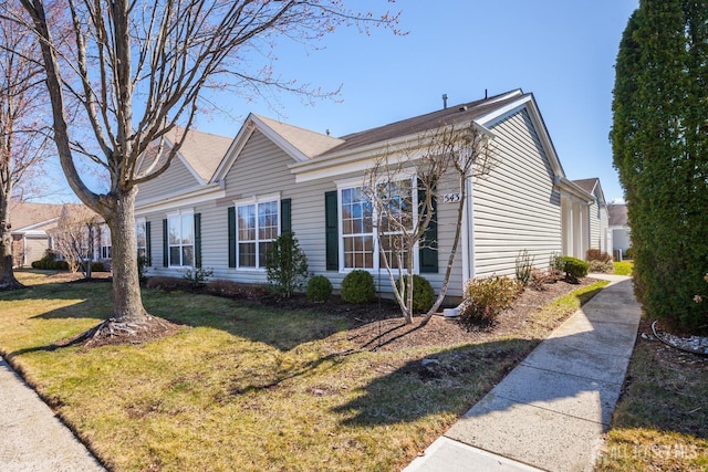 543 Waterside Blvd, Monroe, NJ 08831 - view of front facade with a front yard