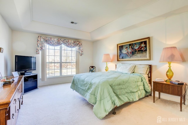 543 Waterside Blvd, Monroe, NJ 08831 - carpeted bedroom featuring a raised ceiling and baseboards