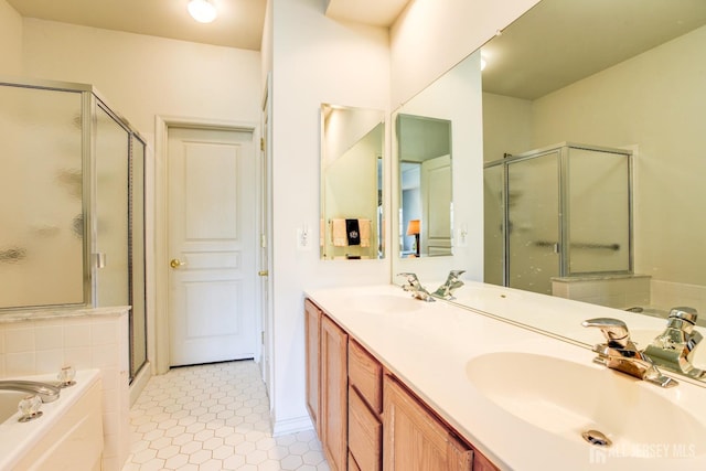 543 Waterside Blvd, Monroe, NJ 08831 - bathroom with a shower stall, a bath, double vanity, and tile patterned flooring