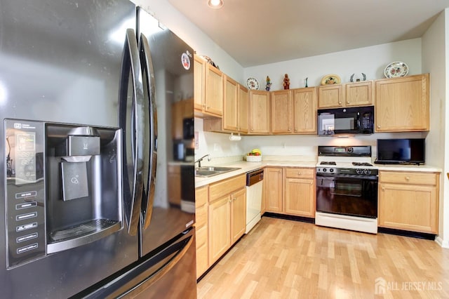 543 Waterside Blvd, Monroe, NJ 08831 - kitchen with fridge with ice dispenser, black microwave, gas range gas stove, light brown cabinetry, and dishwashing machine