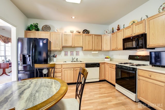 543 Waterside Blvd, Monroe, NJ 08831 - kitchen featuring black appliances, light brown cabinetry, light countertops, light wood-style flooring, and recessed lighting