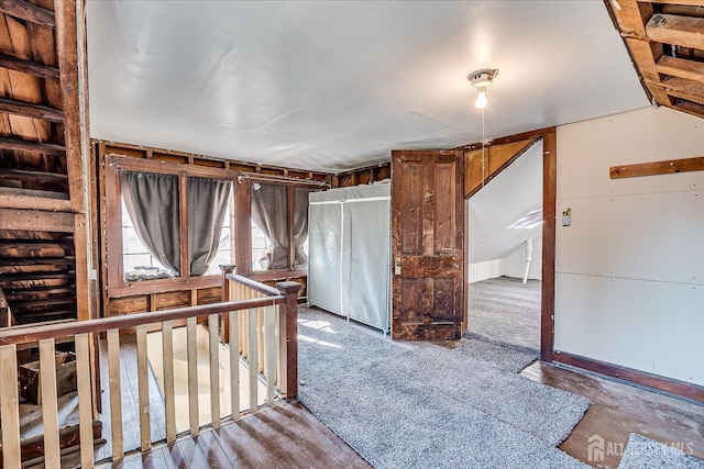 interior space featuring an upstairs landing