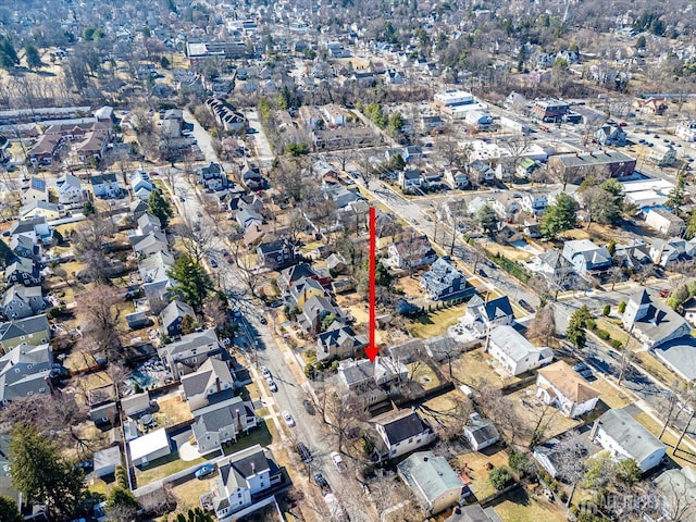 birds eye view of property with a residential view