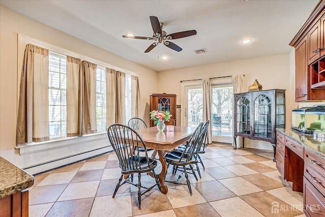 dining area featuring recessed lighting, a baseboard heating unit, visible vents, and ceiling fan