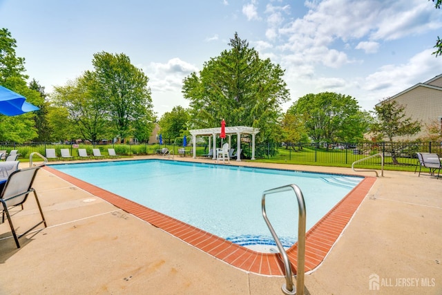 362 Aldeburgh Ave, Franklin Twsp, NJ 08873 - community pool with a pergola and a patio area