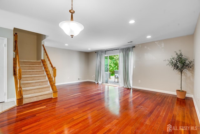 362 Aldeburgh Ave, Franklin Twsp, NJ 08873 - unfurnished living room with wood finished floors, baseboards, and recessed lighting
