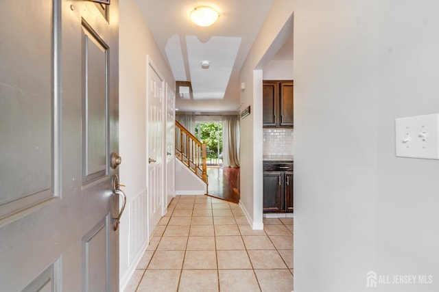 362 Aldeburgh Ave, Franklin Twsp, NJ 08873 - foyer entrance with light tile patterned flooring, stairs, and baseboards