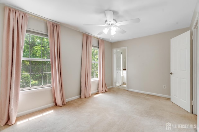 362 Aldeburgh Ave, Franklin Twsp, NJ 08873 - unfurnished bedroom with light carpet, baseboards, and ceiling fan