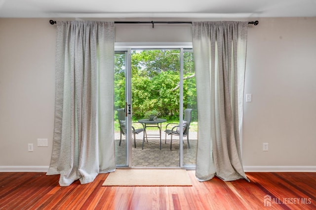 362 Aldeburgh Ave, Franklin Twsp, NJ 08873 - doorway to outside featuring wood finished floors and baseboards