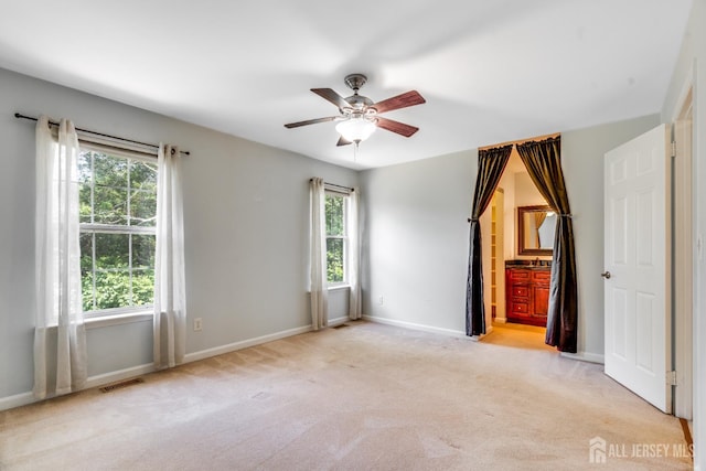 362 Aldeburgh Ave, Franklin Twsp, NJ 08873 - empty room with healthy amount of natural light, carpet flooring, and a ceiling fan