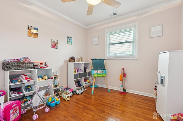522 Hancock St, Middlesex, NJ 08846 - recreation room with ornamental molding, wood finished floors, and ceiling fan