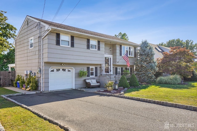 522 Hancock St, Middlesex, NJ 08846 - split foyer home with asphalt driveway and an attached garage