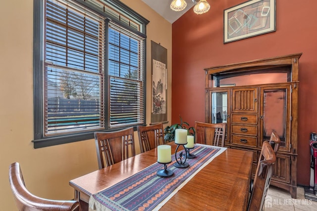 dining space featuring a chandelier
