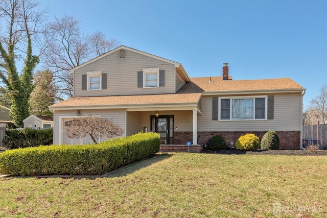 tri-level home with fence, a front lawn, brick siding, a chimney, and a shingled roof