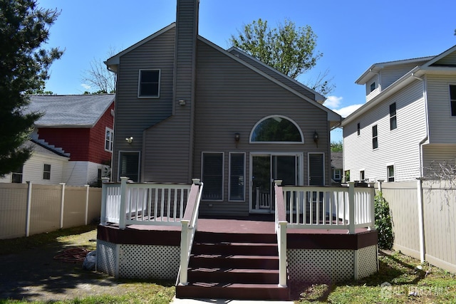 12 Juniper St, Metuchen, NJ 08840 - back of house with a wooden deck and a chimney