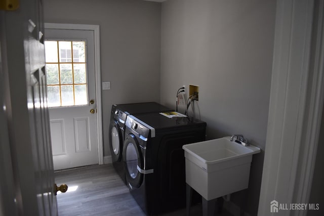 12 Juniper St, Metuchen, NJ 08840 - laundry room featuring washer and dryer and light wood-style flooring