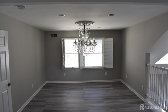 12 Juniper St, Metuchen, NJ 08840 - unfurnished dining area featuring a chandelier, dark wood-style floors, and baseboards
