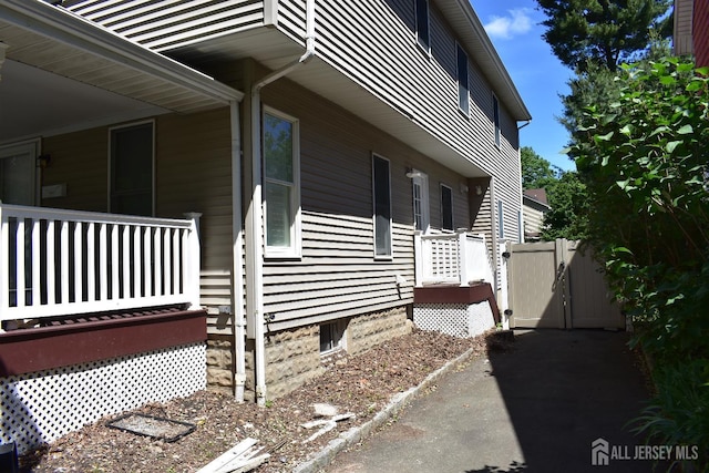 12 Juniper St, Metuchen, NJ 08840 - view of side of home with a gate