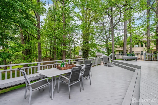 13 Clinton Ave, Edison, NJ 08820 - wooden deck with outdoor dining area