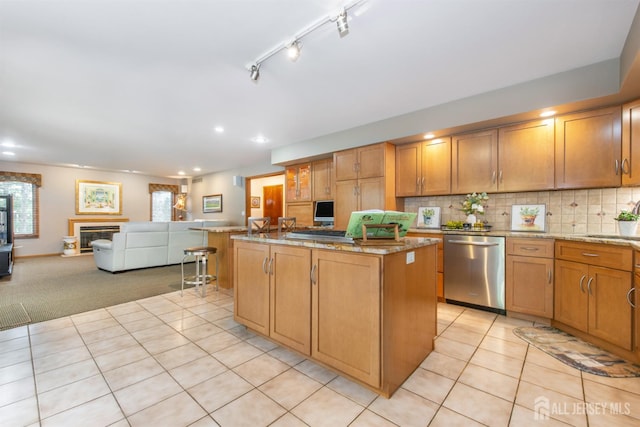 13 Clinton Ave, Edison, NJ 08820 - kitchen with dishwasher, a center island, open floor plan, light stone counters, and recessed lighting