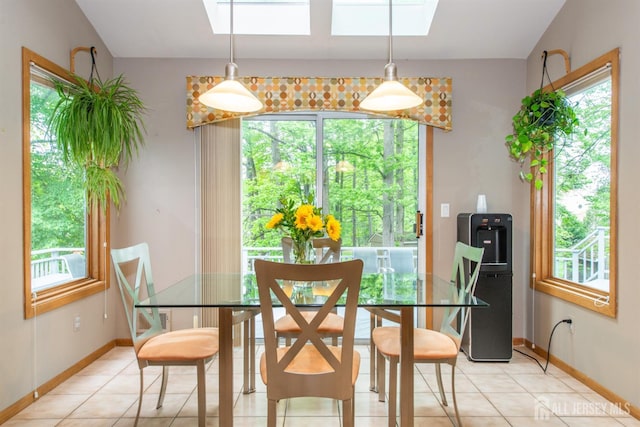 13 Clinton Ave, Edison, NJ 08820 - dining area with a skylight, healthy amount of natural light, and light tile patterned floors