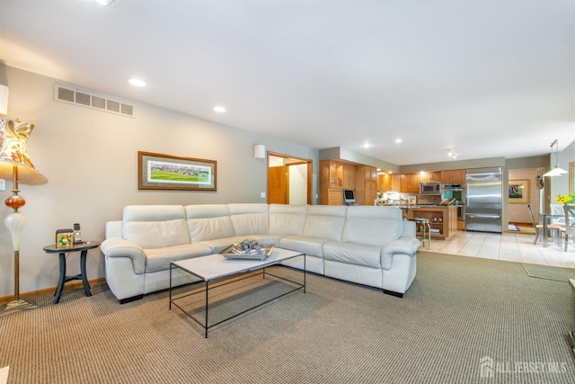 13 Clinton Ave, Edison, NJ 08820 - living area featuring light carpet, recessed lighting, and baseboards
