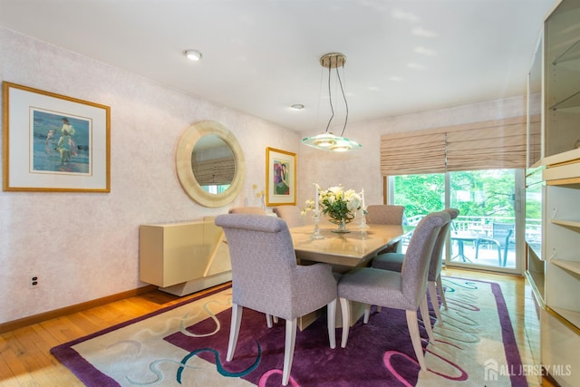 13 Clinton Ave, Edison, NJ 08820 - dining area featuring hardwood / wood-style flooring, baseboards, and a textured wall