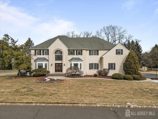 view of front of house with a front lawn