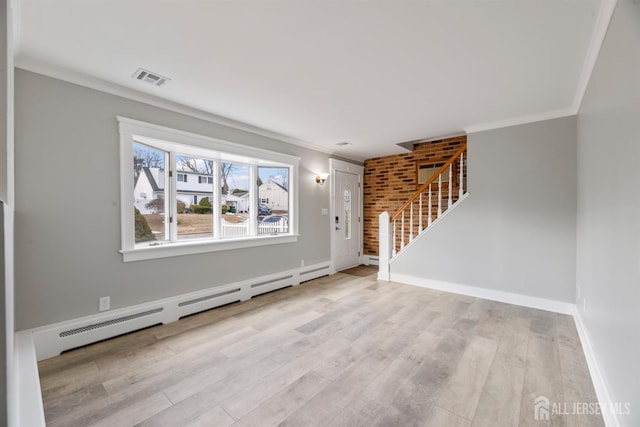 unfurnished living room with stairway, a baseboard radiator, wood finished floors, baseboards, and ornamental molding