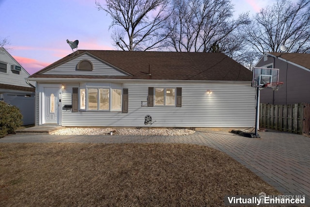 view of front of home with fence