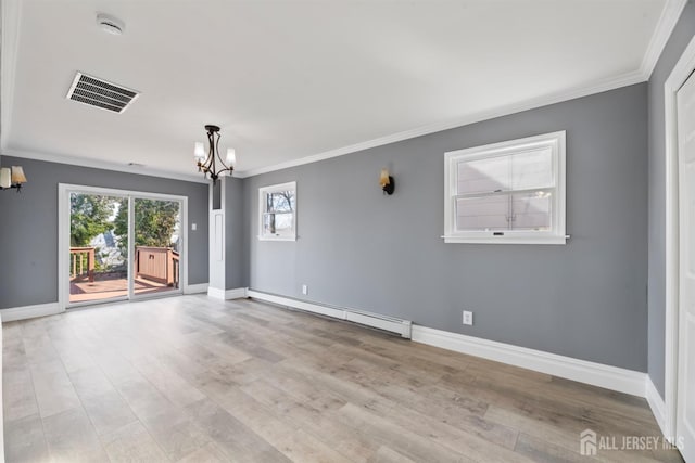 empty room with an inviting chandelier, visible vents, crown molding, baseboards, and a baseboard radiator