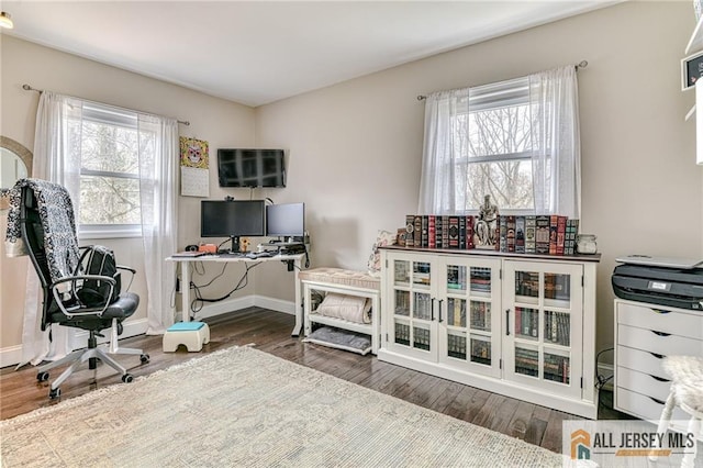 office area featuring wood finished floors and baseboards