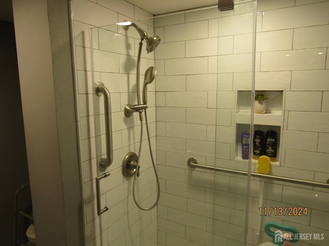 bathroom featuring a stall shower