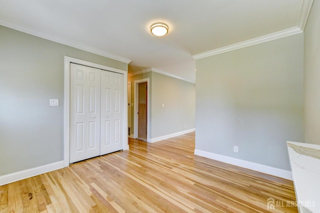 21 Princeton Rd, Old Bridge, NJ 08859 - unfurnished bedroom with ornamental molding, light wood finished floors, and a closet