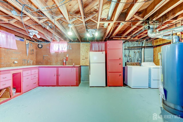 21 Princeton Rd, Old Bridge, NJ 08859 - below grade area featuring freestanding refrigerator, water heater, and separate washer and dryer
