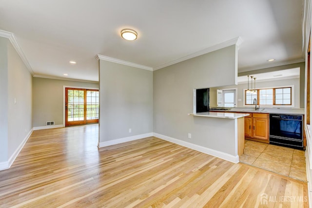 21 Princeton Rd, Old Bridge, NJ 08859 - kitchen featuring dishwasher, crown molding, light wood finished floors, healthy amount of natural light, and light countertops