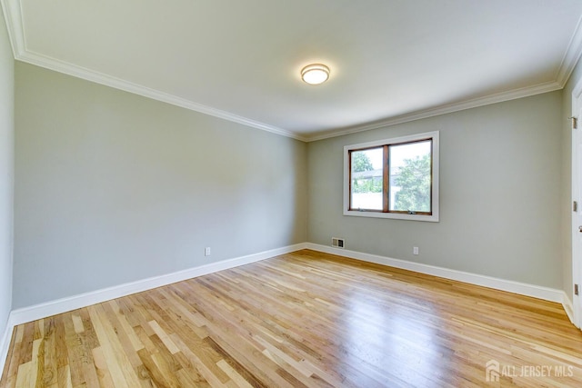 21 Princeton Rd, Old Bridge, NJ 08859 - empty room with light wood-type flooring and crown molding