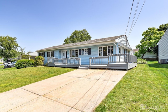 21 Princeton Rd, Old Bridge, NJ 08859 - single story home featuring a wooden deck, a front yard, and concrete driveway