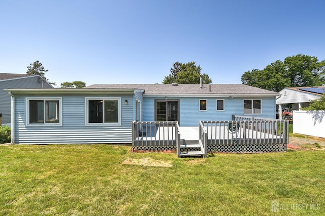 21 Princeton Rd, Old Bridge, NJ 08859 - rear view of house featuring a lawn and a deck