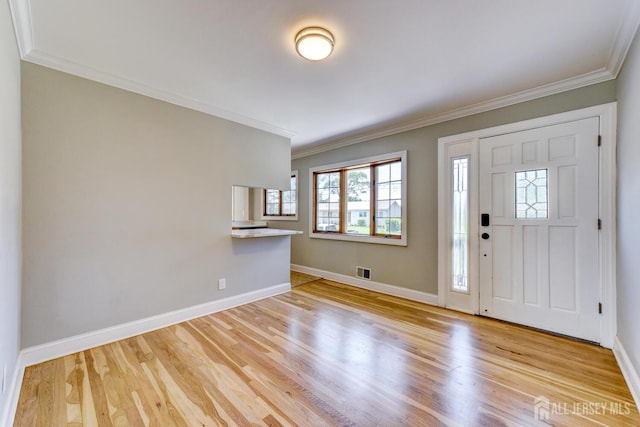 21 Princeton Rd, Old Bridge, NJ 08859 - entrance foyer featuring wood finished floors and crown molding