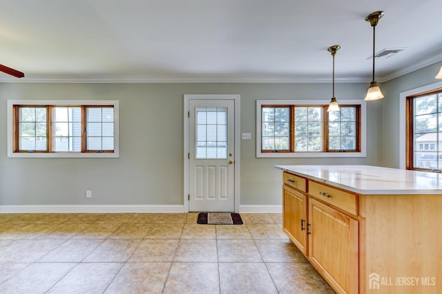 21 Princeton Rd, Old Bridge, NJ 08859 - kitchen featuring light countertops, crown molding, light tile patterned floors, and pendant lighting