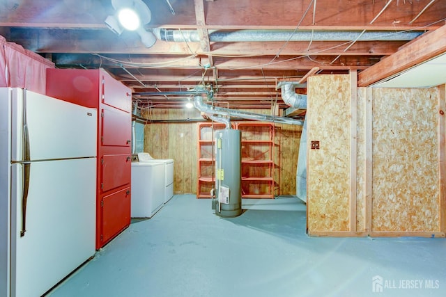 21 Princeton Rd, Old Bridge, NJ 08859 - unfinished below grade area with freestanding refrigerator, gas water heater, and independent washer and dryer
