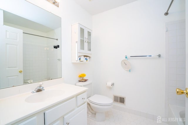 full bathroom with vanity, bathing tub / shower combination, toilet, visible vents, and tile patterned flooring