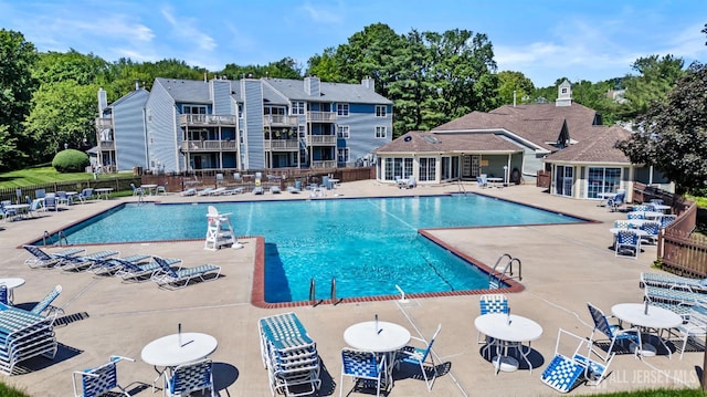 6072 Cedar Ct, South Brunswick, NJ 08852 - community pool featuring a patio
