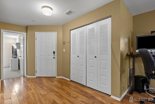 6072 Cedar Ct, South Brunswick, NJ 08852 - entrance foyer featuring light wood finished floors and baseboards