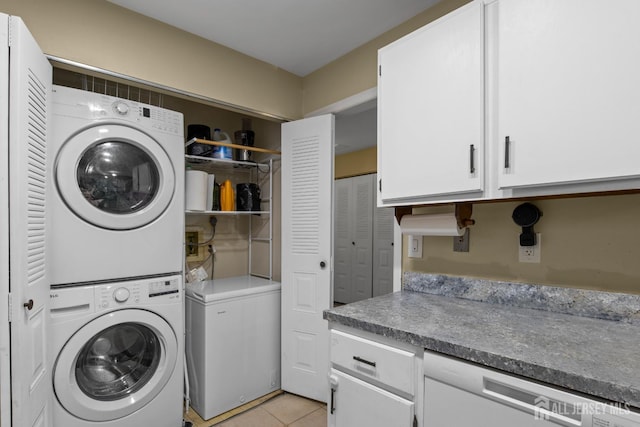 6072 Cedar Ct, South Brunswick, NJ 08852 - laundry room with stacked washer / drying machine and light tile patterned floors