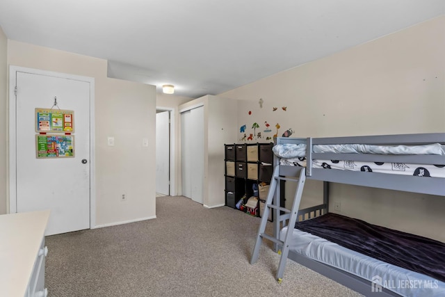 6072 Cedar Ct, South Brunswick, NJ 08852 - carpeted bedroom featuring baseboards and a closet